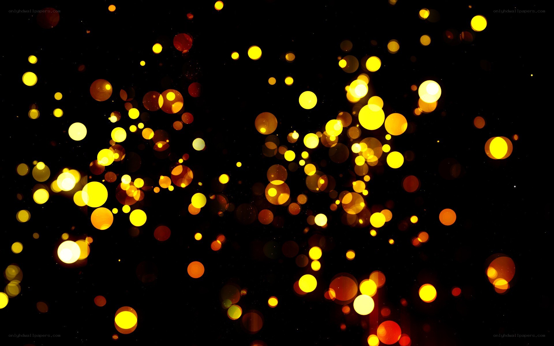 golden bokeh lights on black