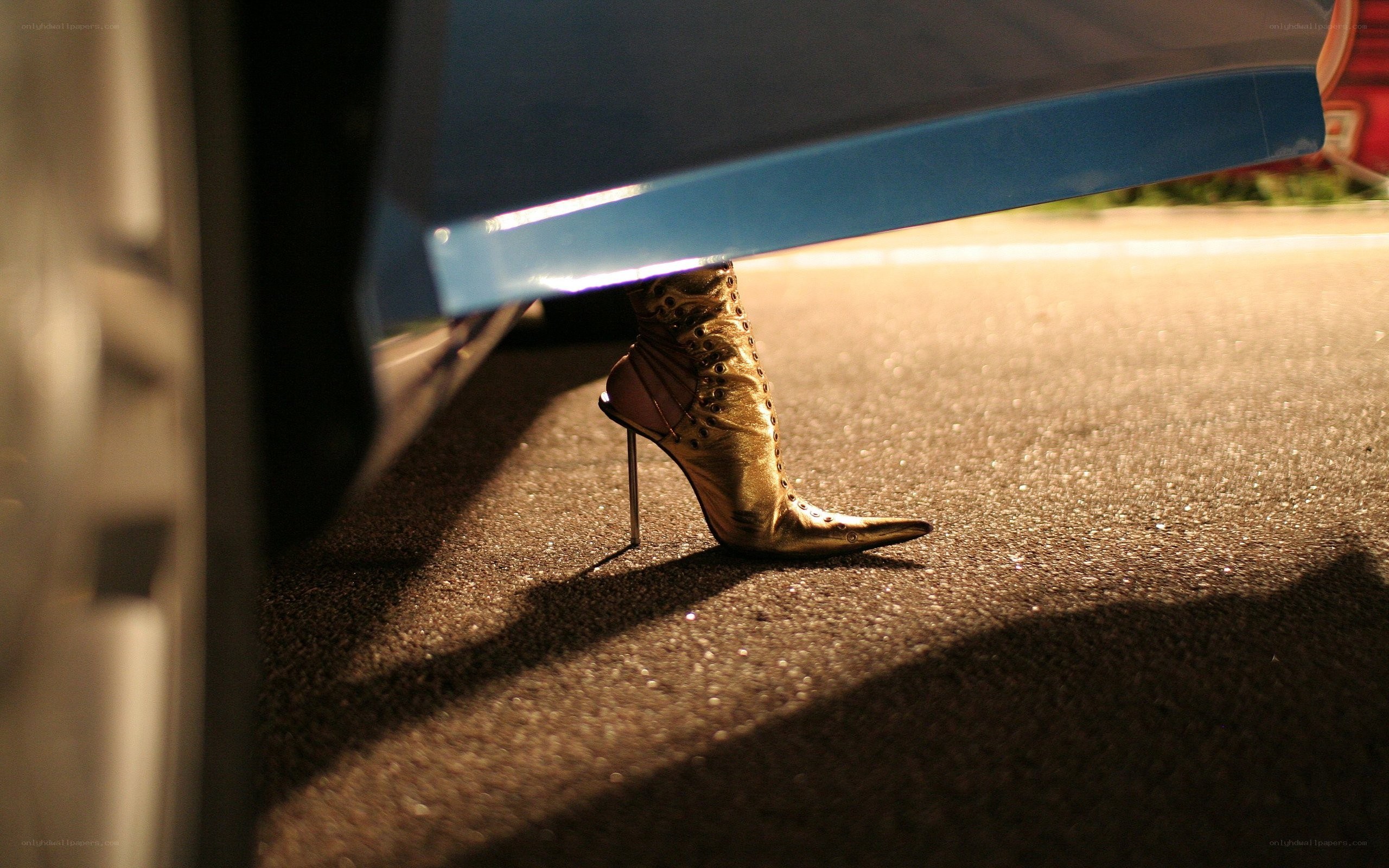 golden boot under car
