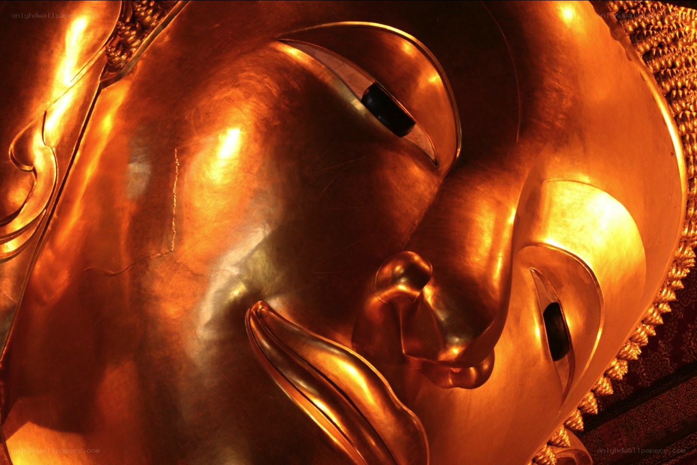 Golden Buddha face close-up