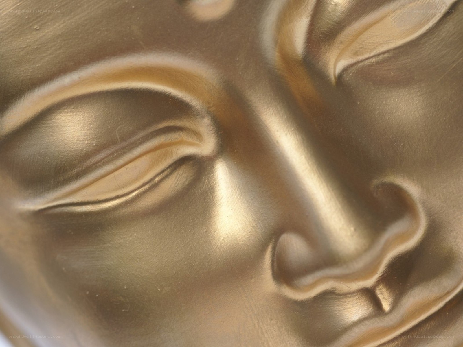 golden buddha face close-up