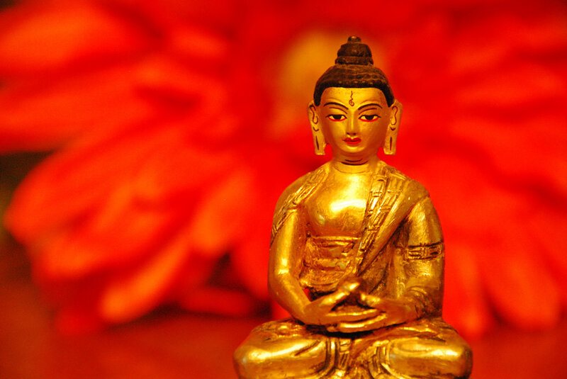 Golden Buddha Statue — Gold, Serene, Photograph, Red Background, Lotus Flower