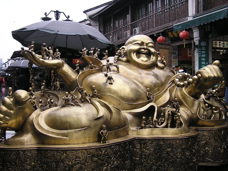 Golden Buddha statue in market