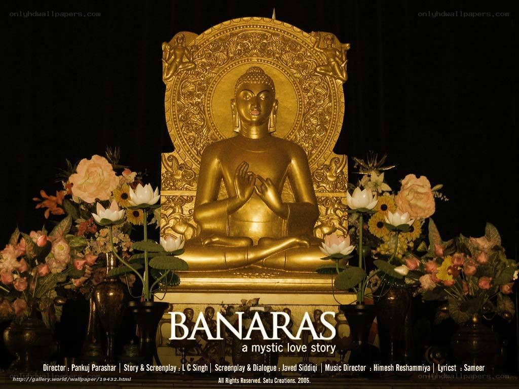 Golden Buddha statue with flowers