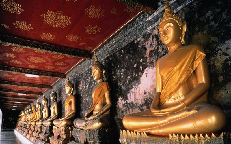 Golden Buddha statues in temple