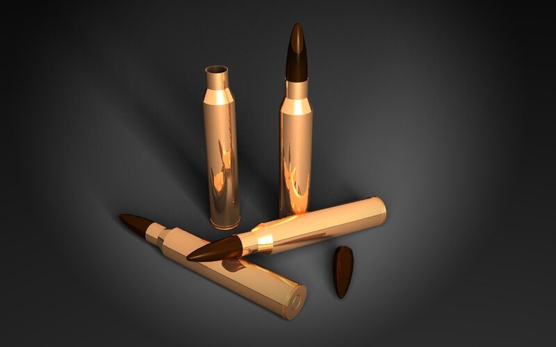 golden bullets on dark background
