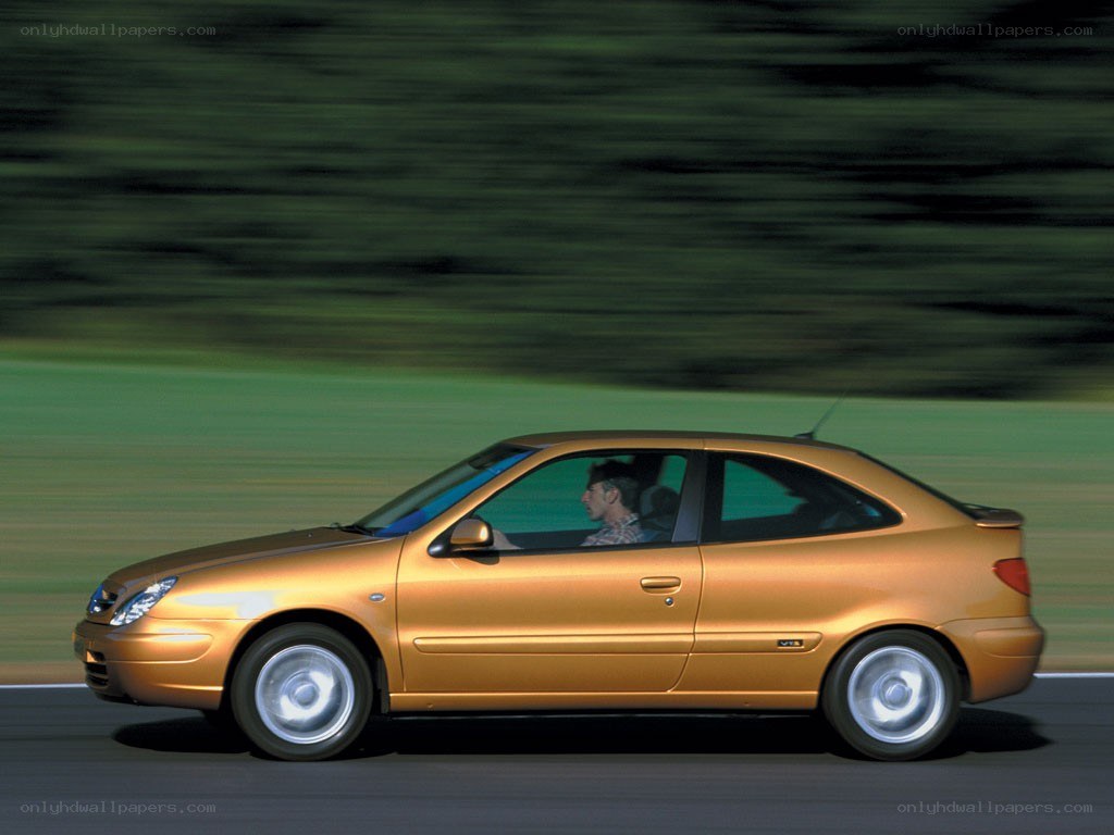 golden car in motion