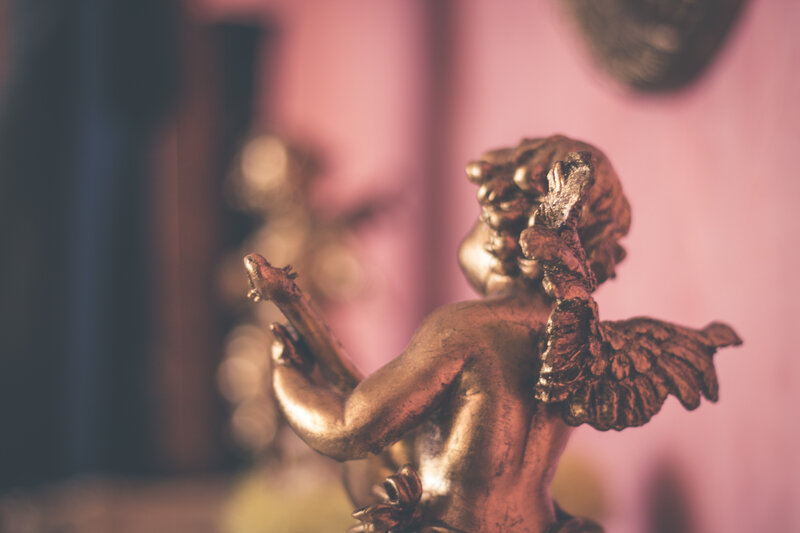 golden cherub statue