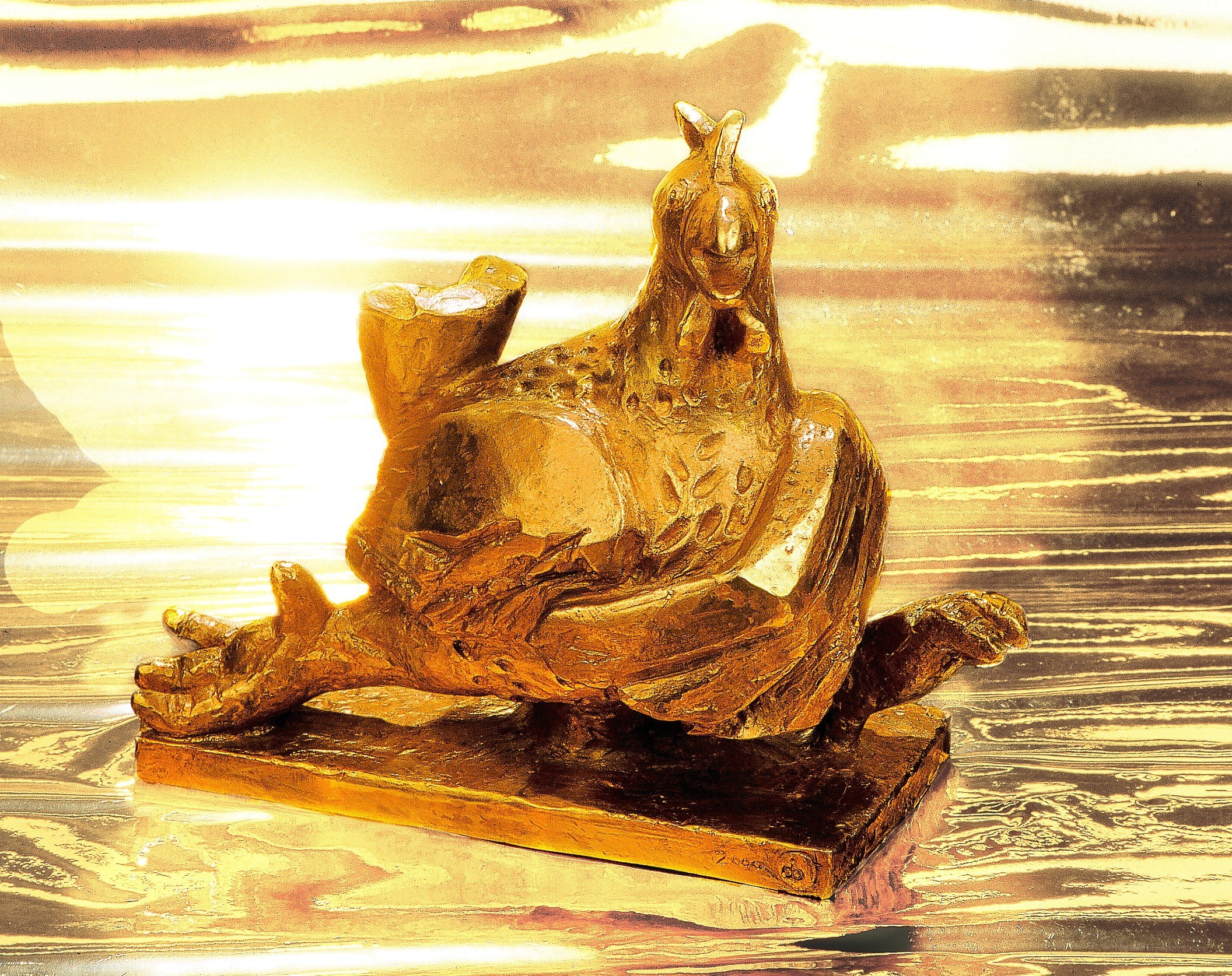 golden chicken sculpture