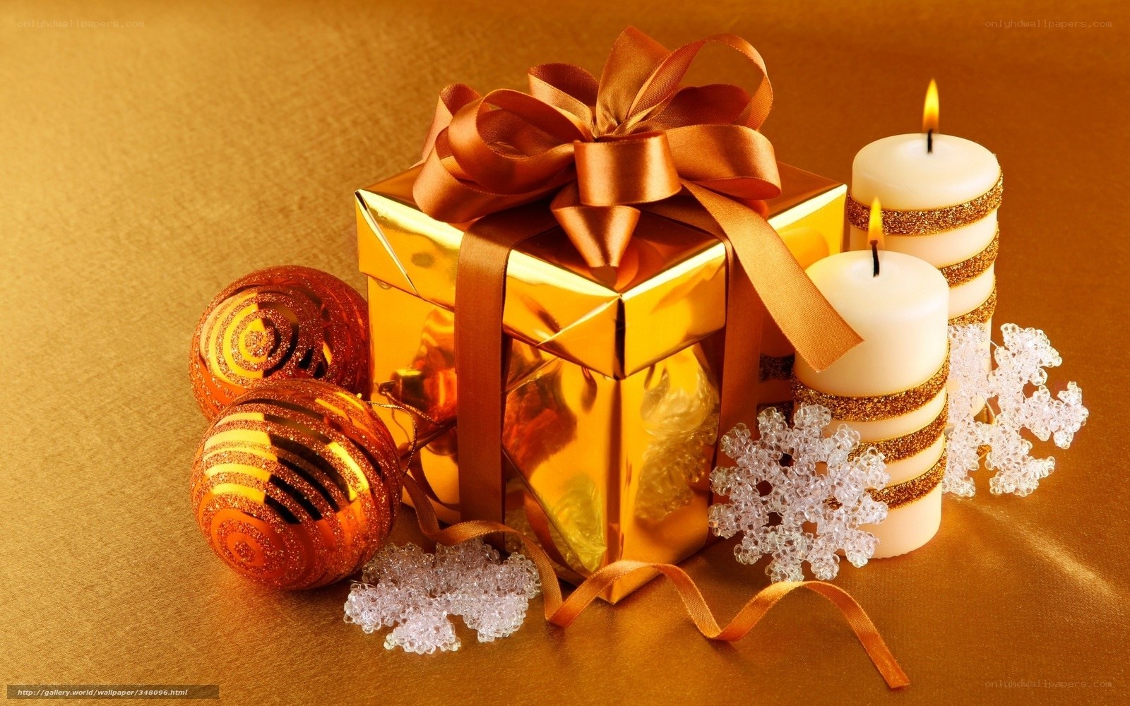 Golden Christmas gift and candles