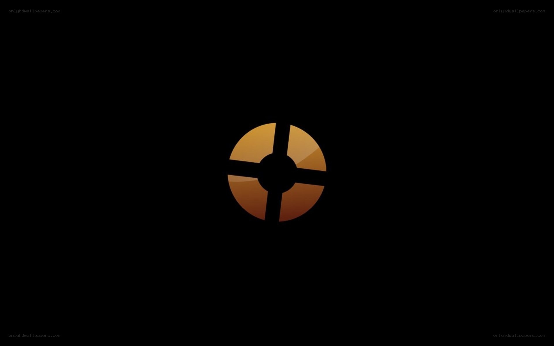 golden circular logo on black