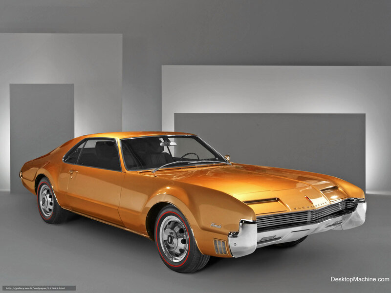 Golden classic car in studio