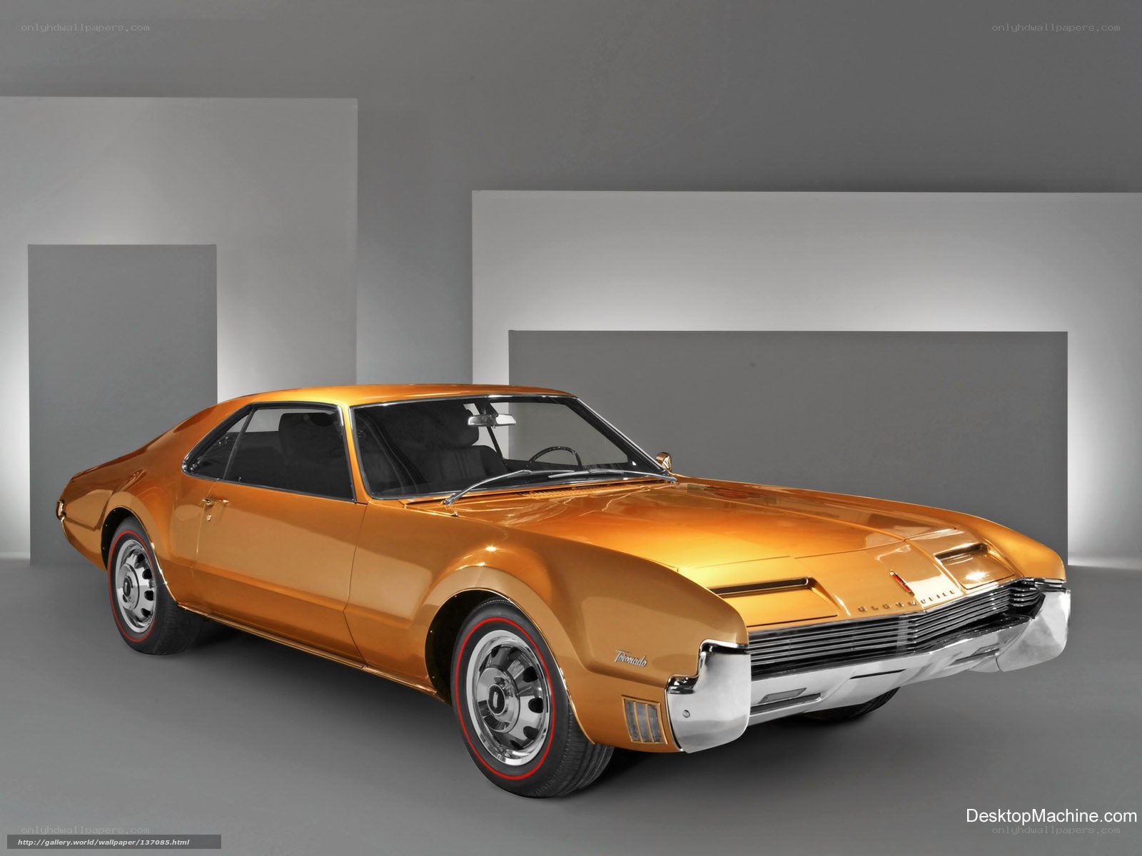 Golden classic car in studio