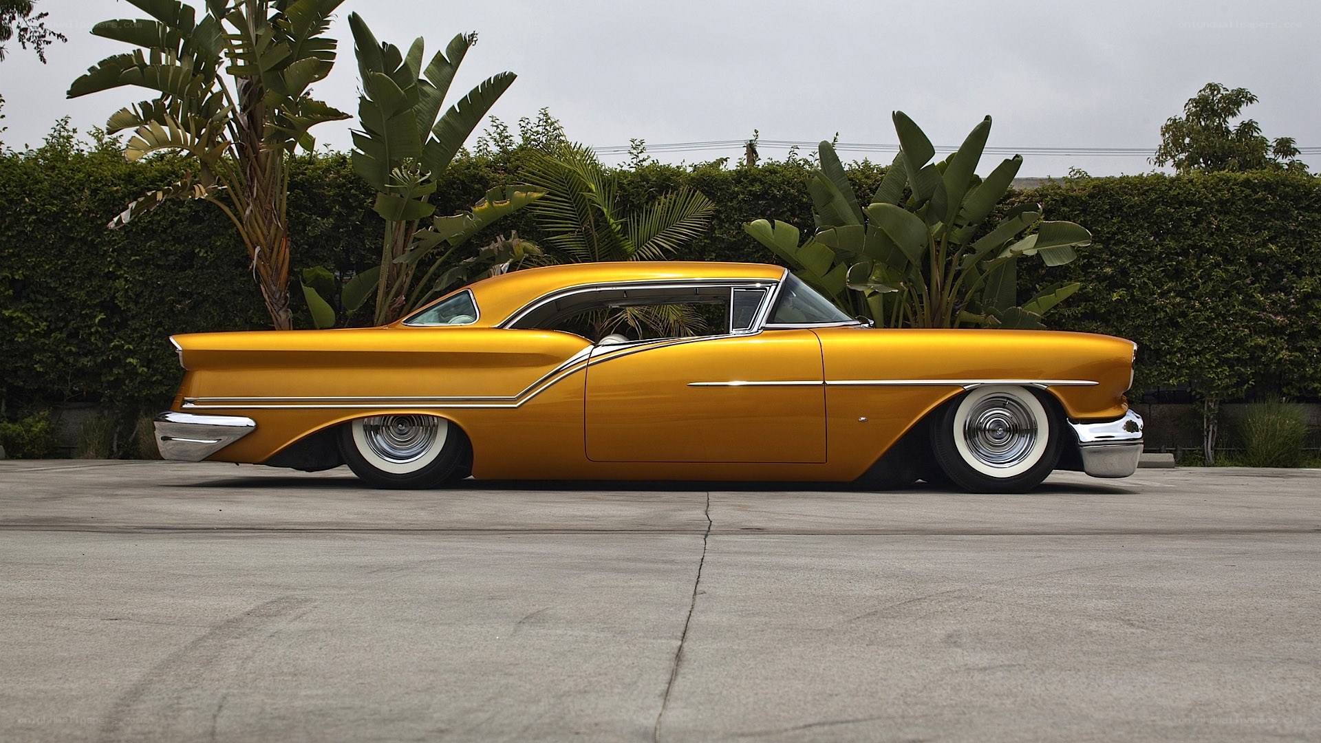 golden classic car side view