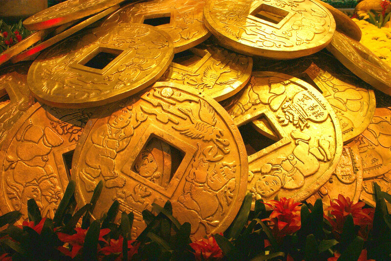 Golden coins with carvings