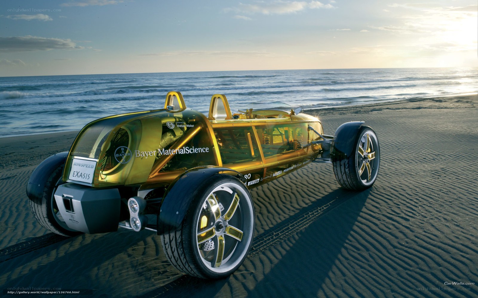 Golden concept car on beach