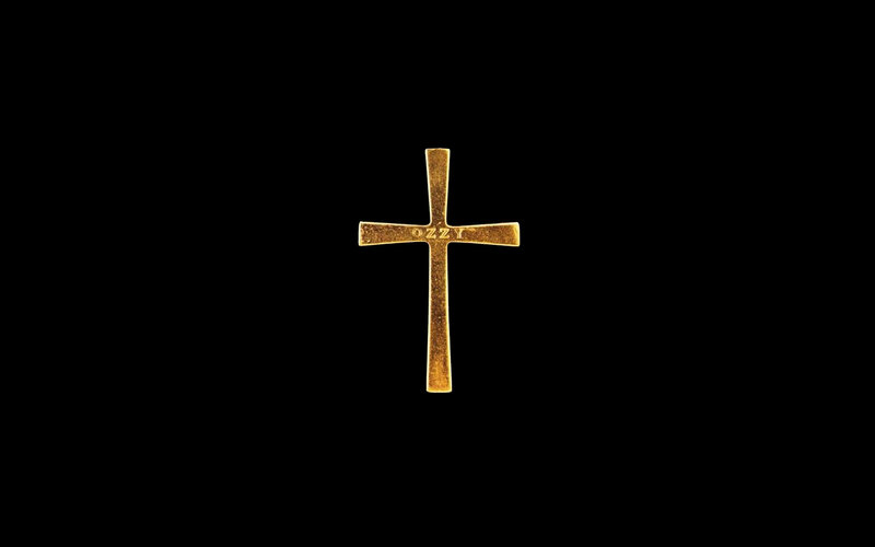 golden cross with ozzy inscription