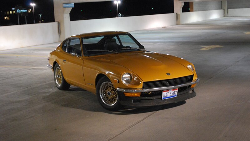 Golden Datsun 240Z at night