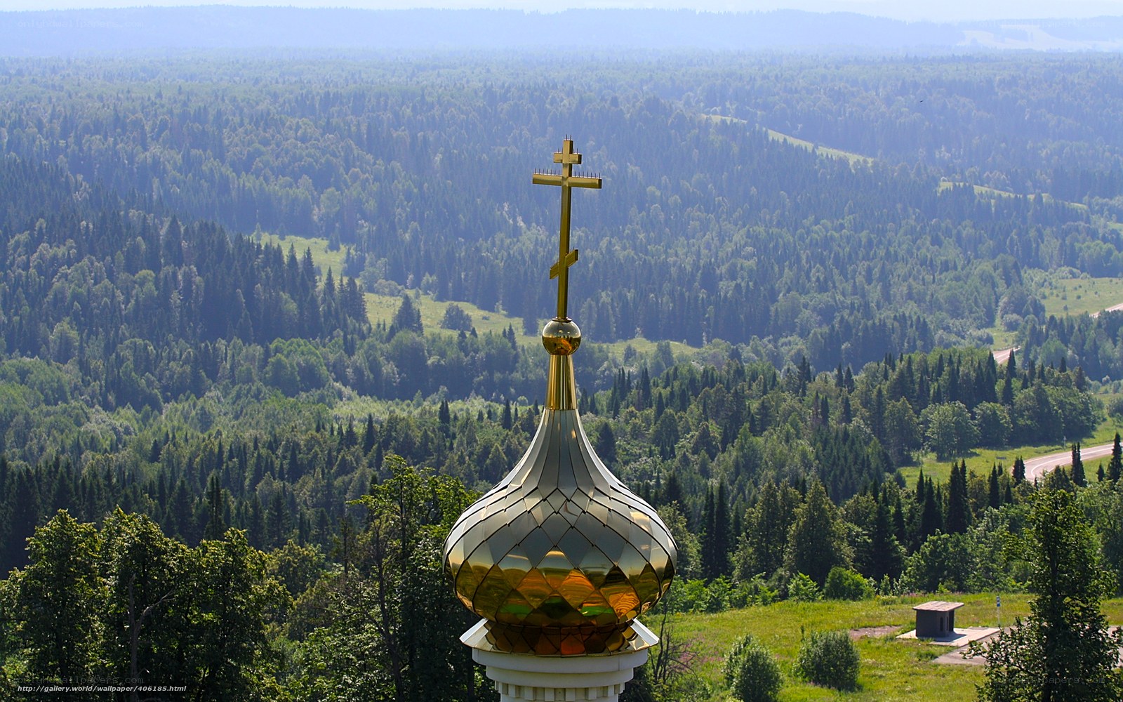 Golden dome over forest landscape