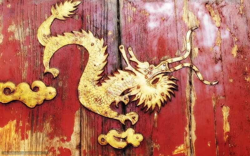 Golden dragon on red door