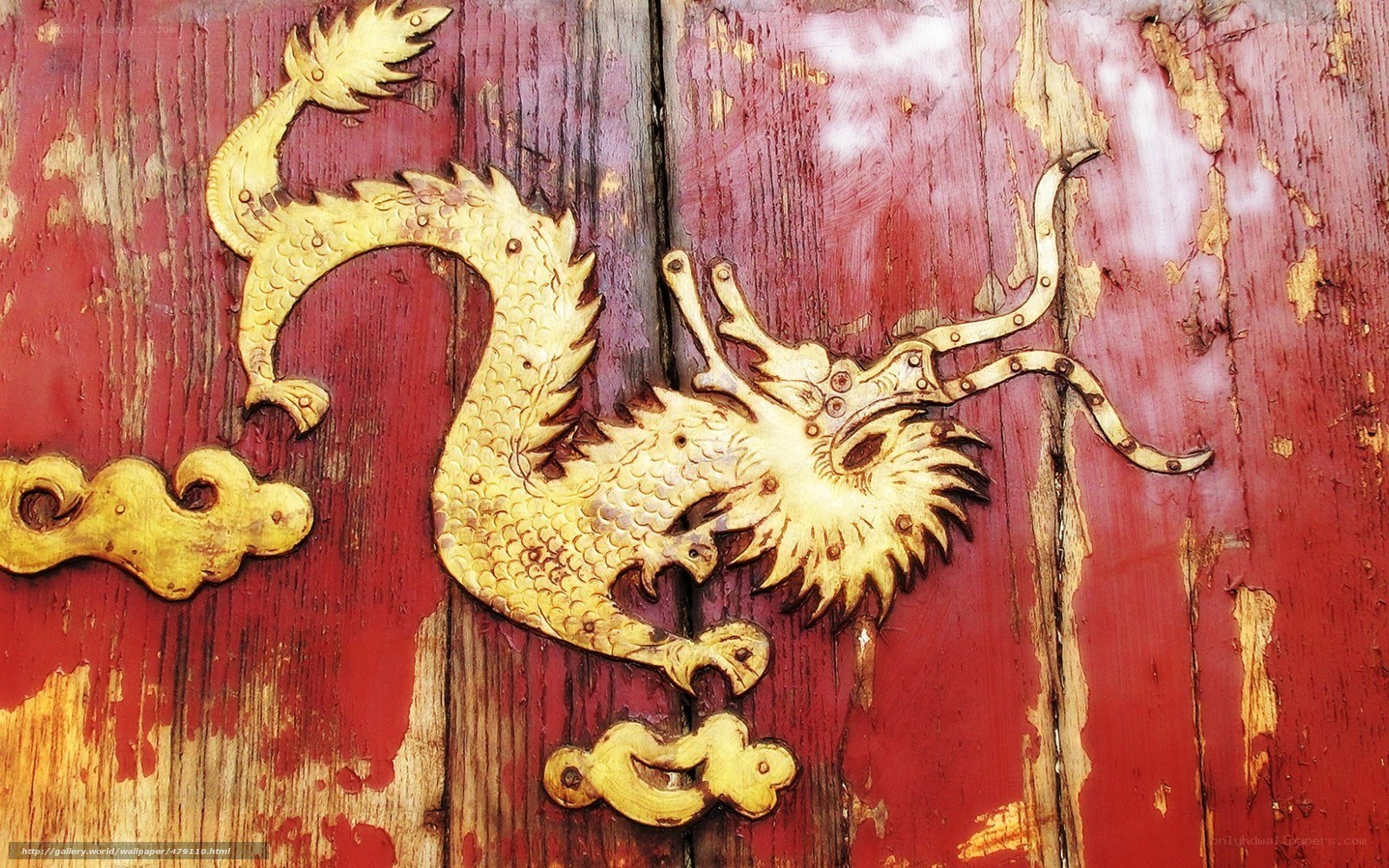 Golden dragon on red door