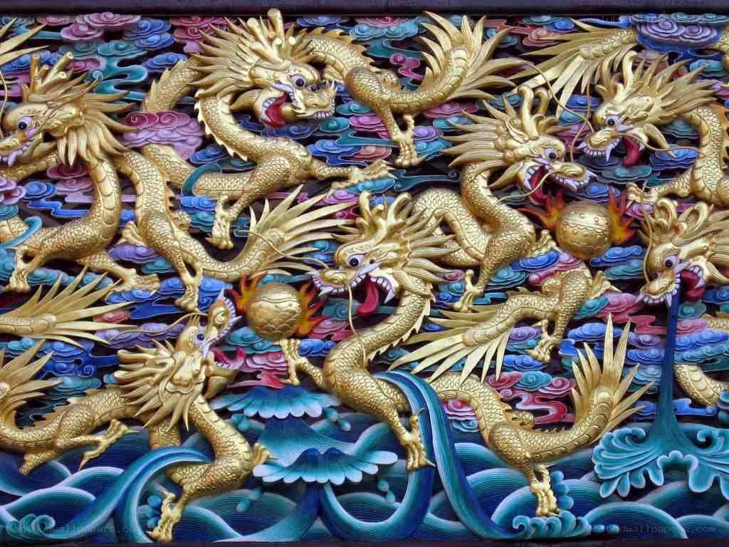 Golden dragons on cloud and wave carving
