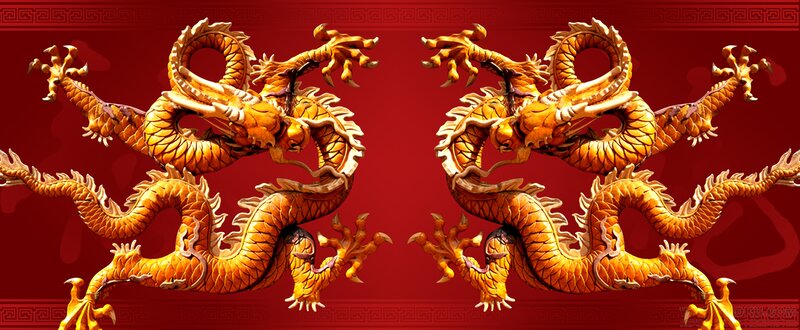 Golden dragons on red background