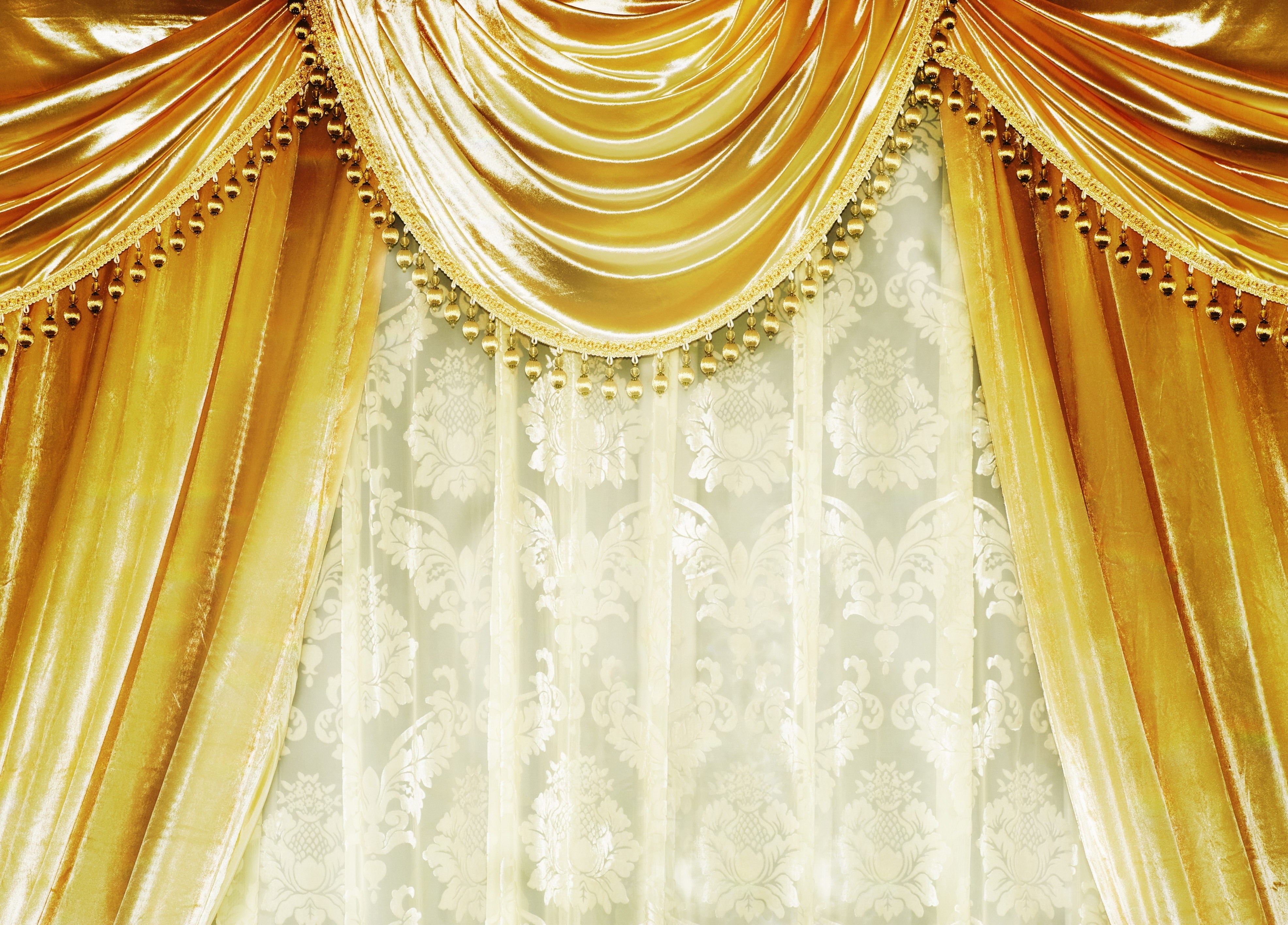 Golden drapery with beaded trim