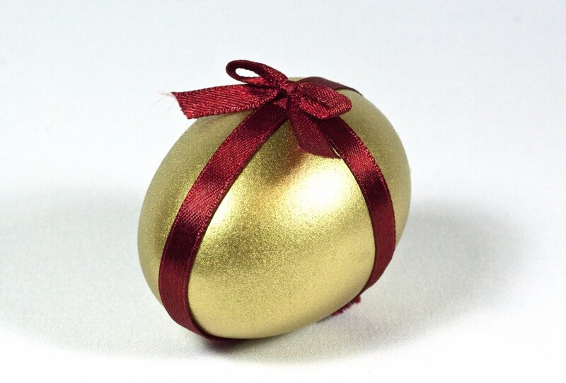Golden Egg with Red Ribbon — Gold