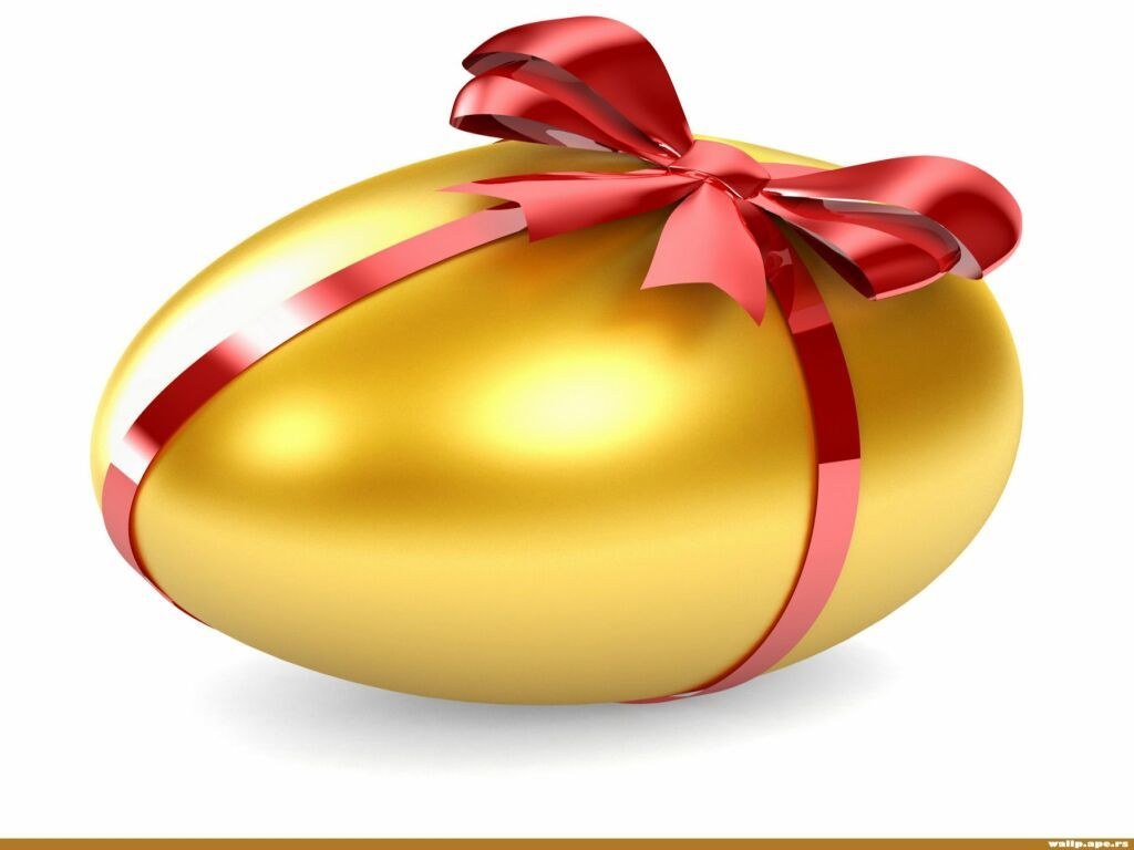 golden egg with red ribbon