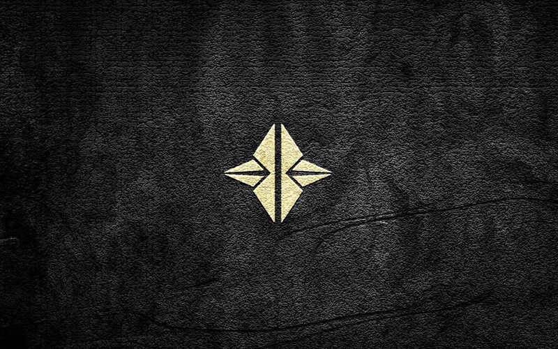 golden emblem on dark textured background