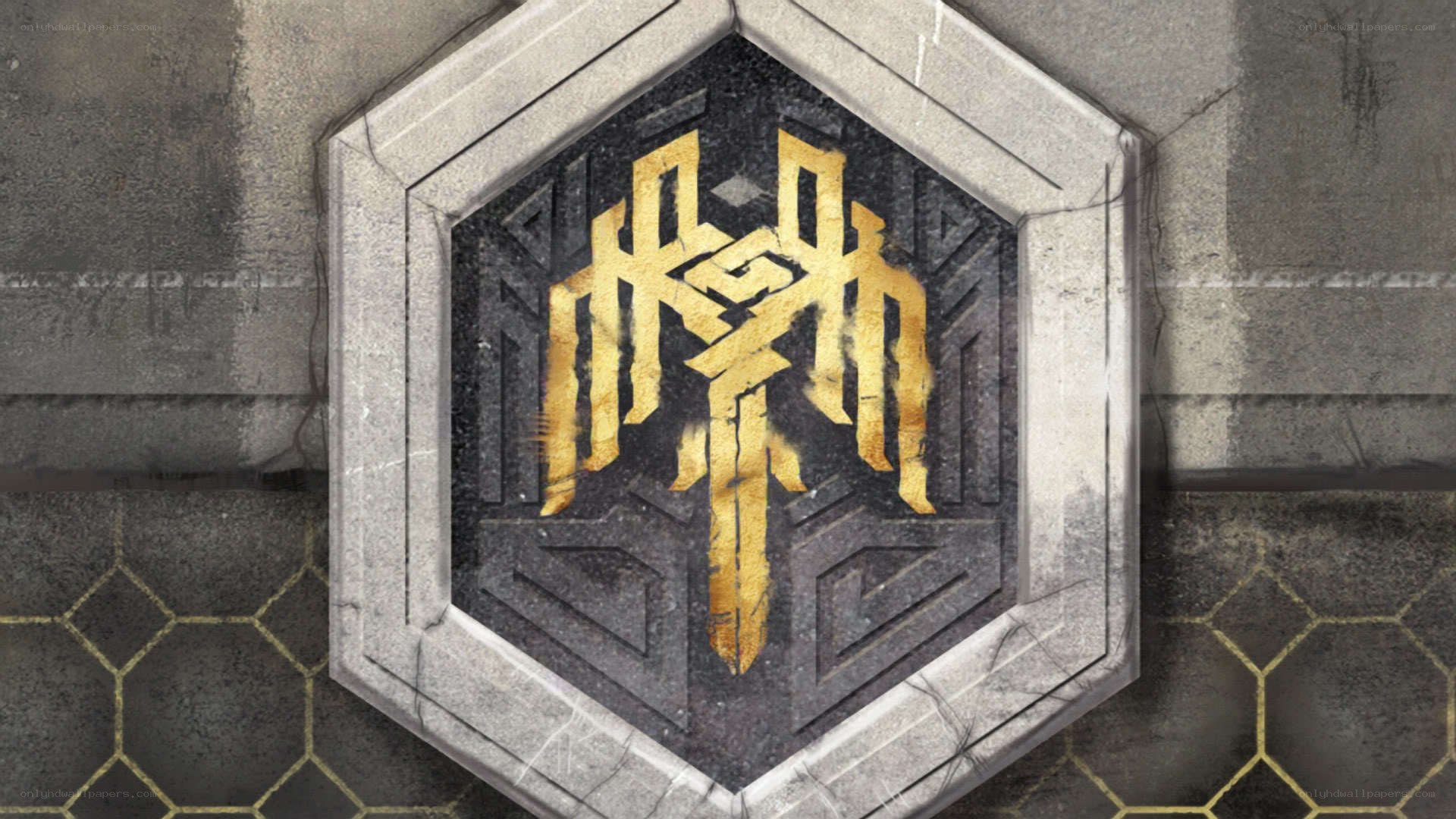 golden emblem on stone wall