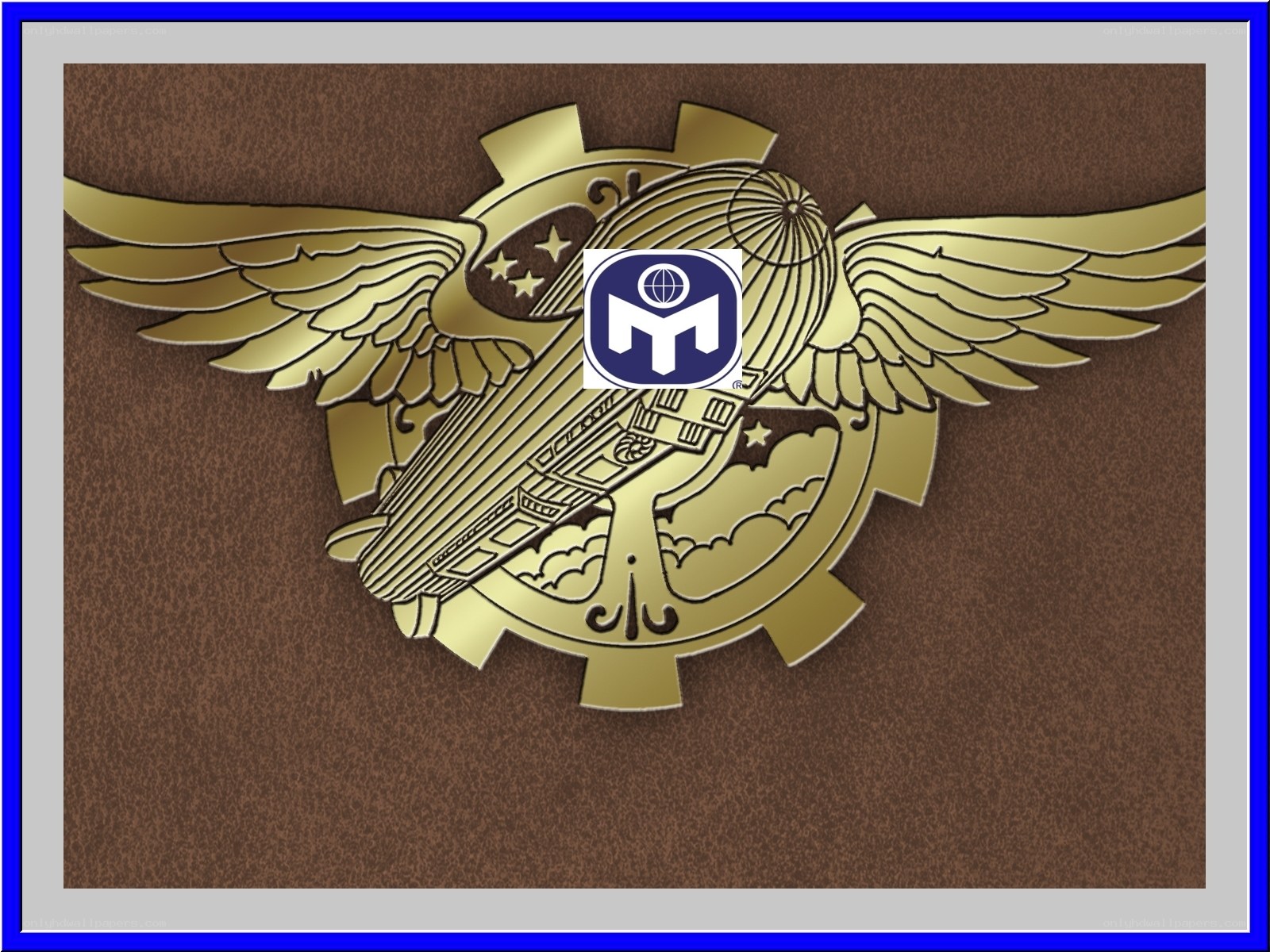 golden emblem with wings and gear