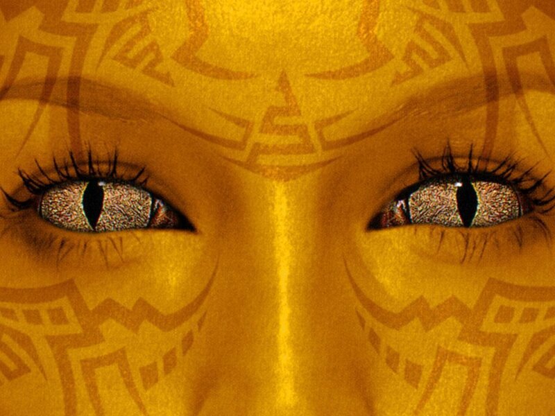 golden face with tribal patterns