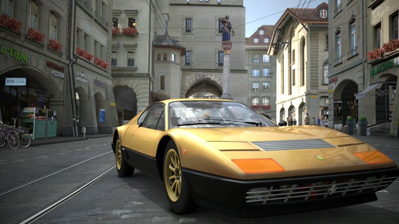Golden Ferrari in city street