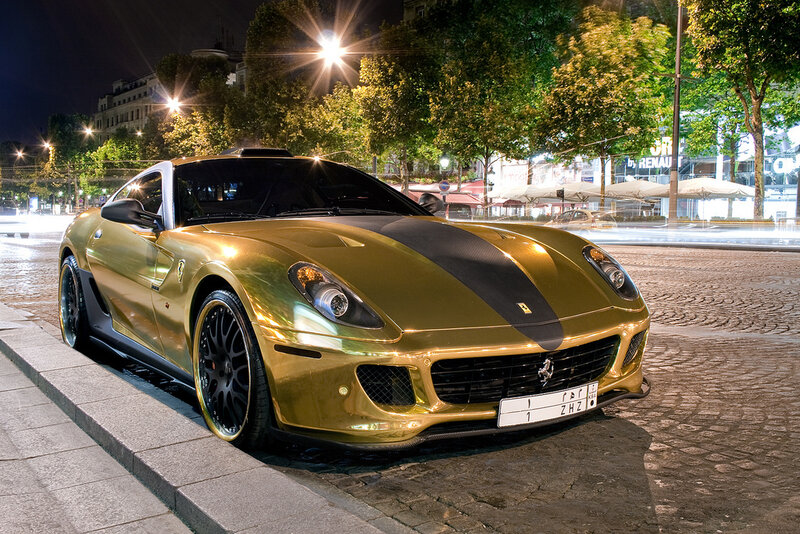Golden Ferrari on city street