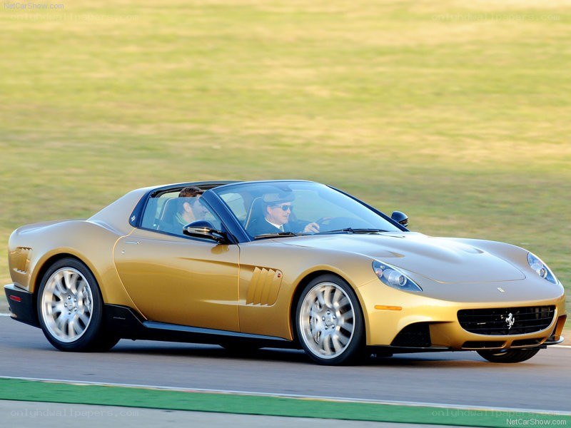 golden ferrari on racetrack