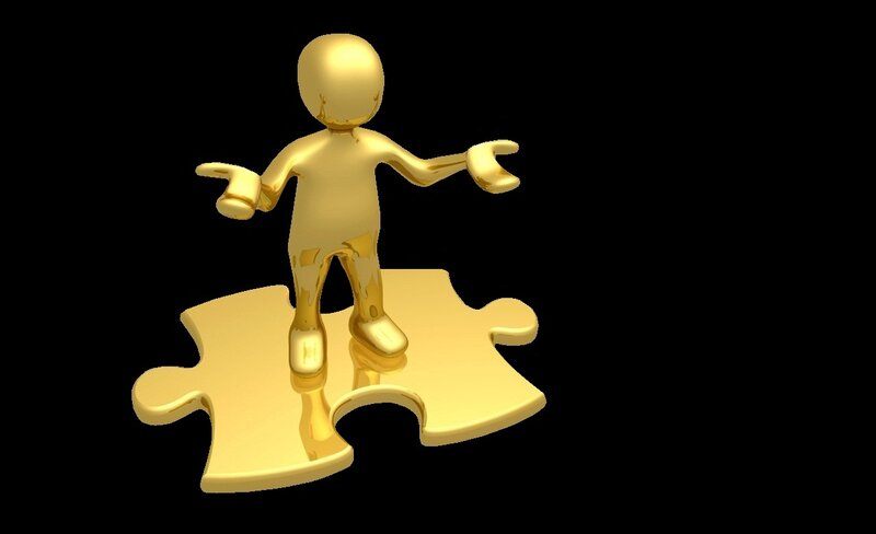 Golden Figure on Puzzle Piece — Gold