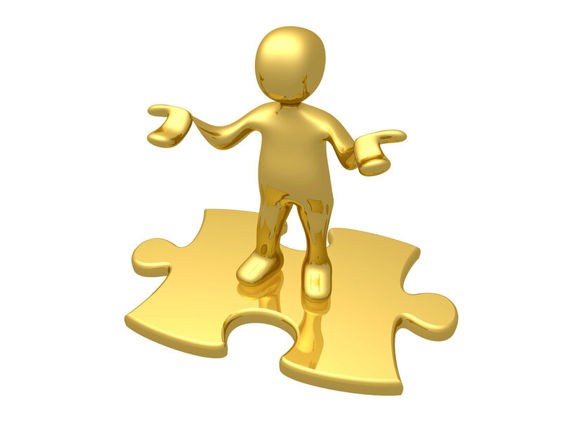 golden figure on puzzle piece
