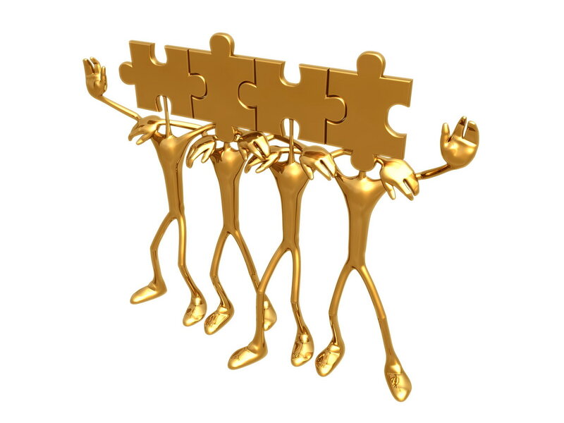 Golden Figures Holding Puzzle Pieces