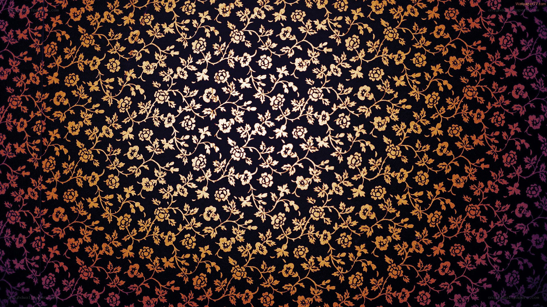golden floral pattern on black
