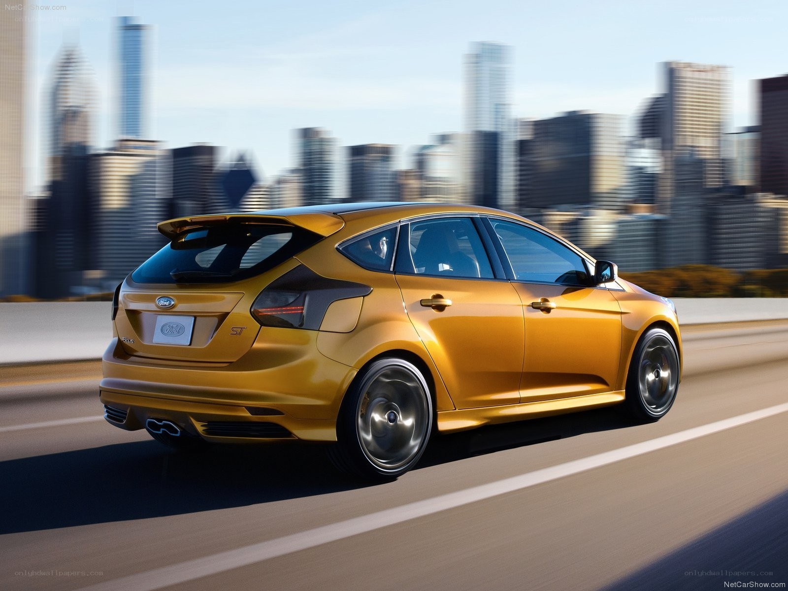 Golden Ford Focus ST in motion
