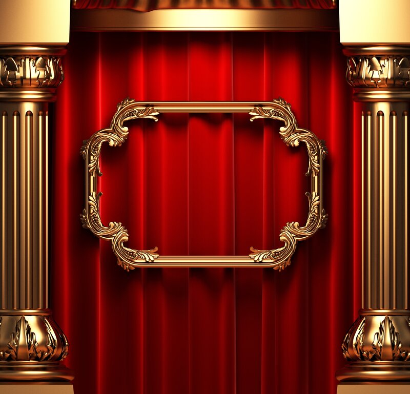golden frame on red curtain