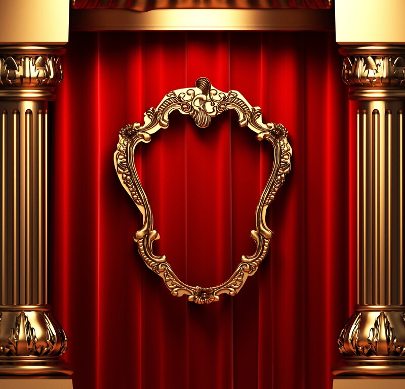 golden frame on red curtain
