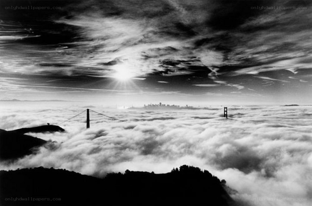Golden Gate Bridge above clouds