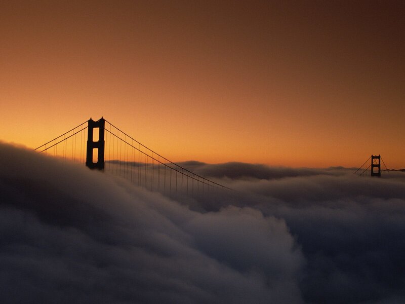Golden Gate Bridge above clouds