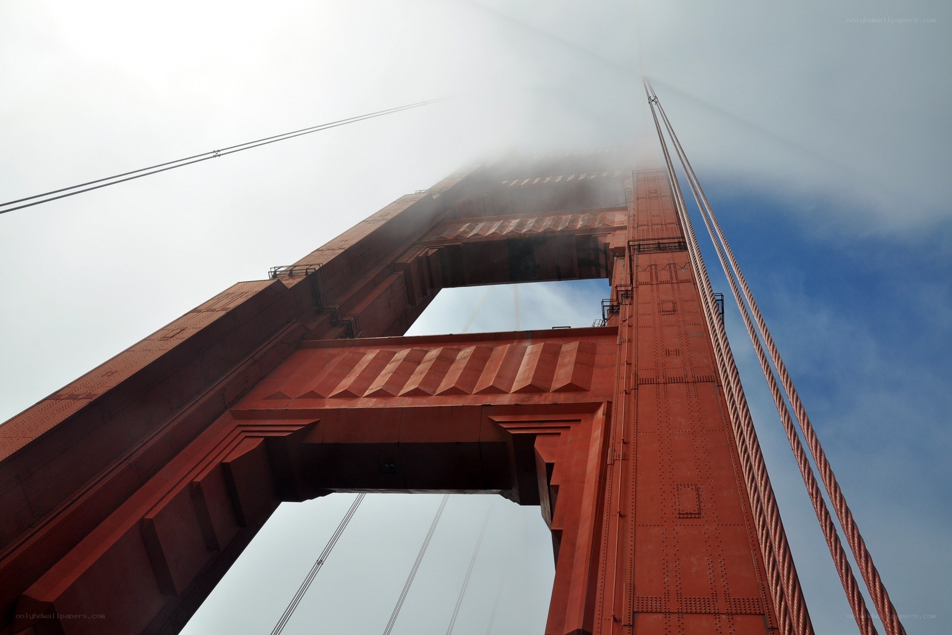 Golden Gate Bridge tower in fog