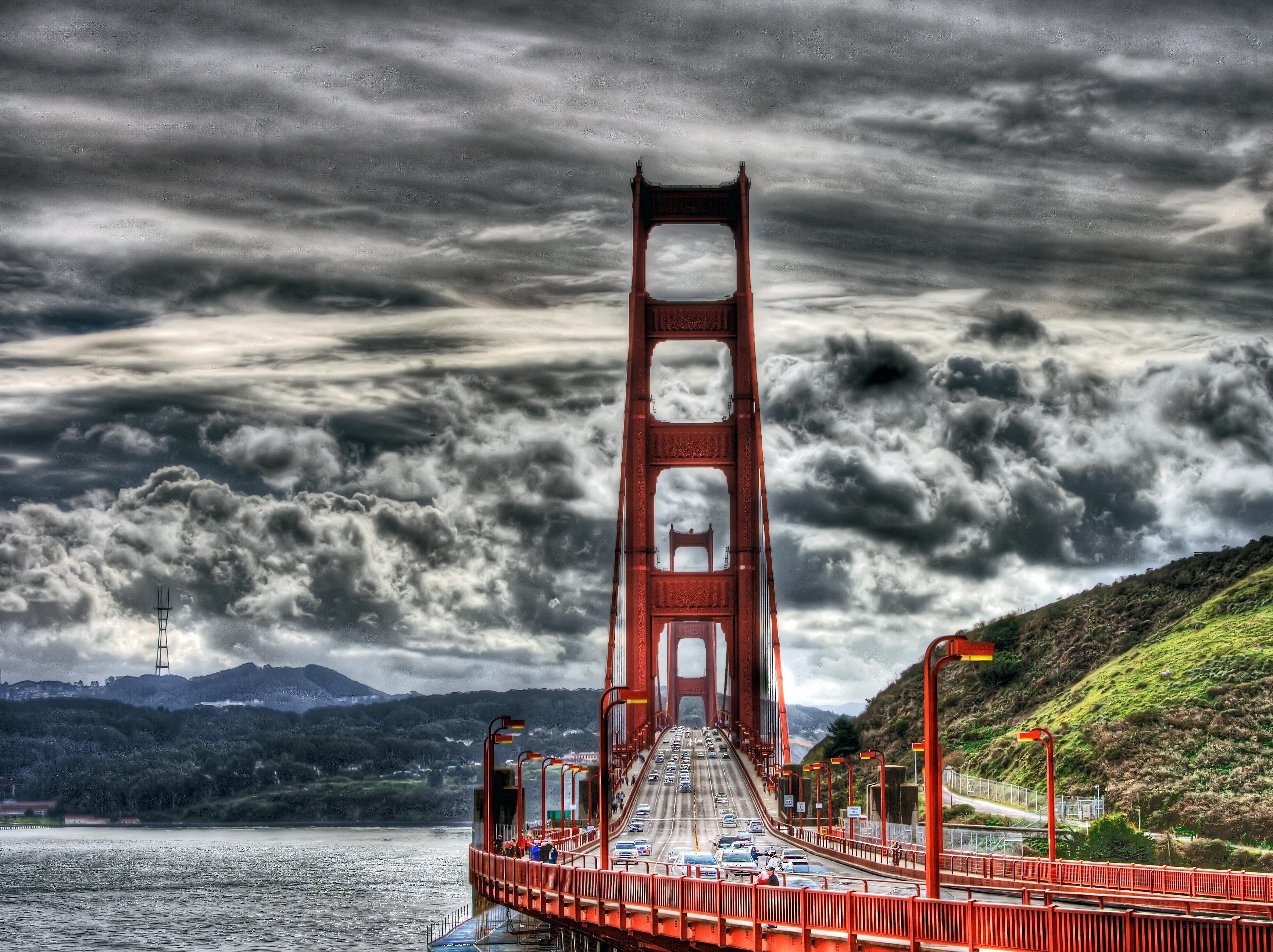 Golden Gate Bridge under stormy sky