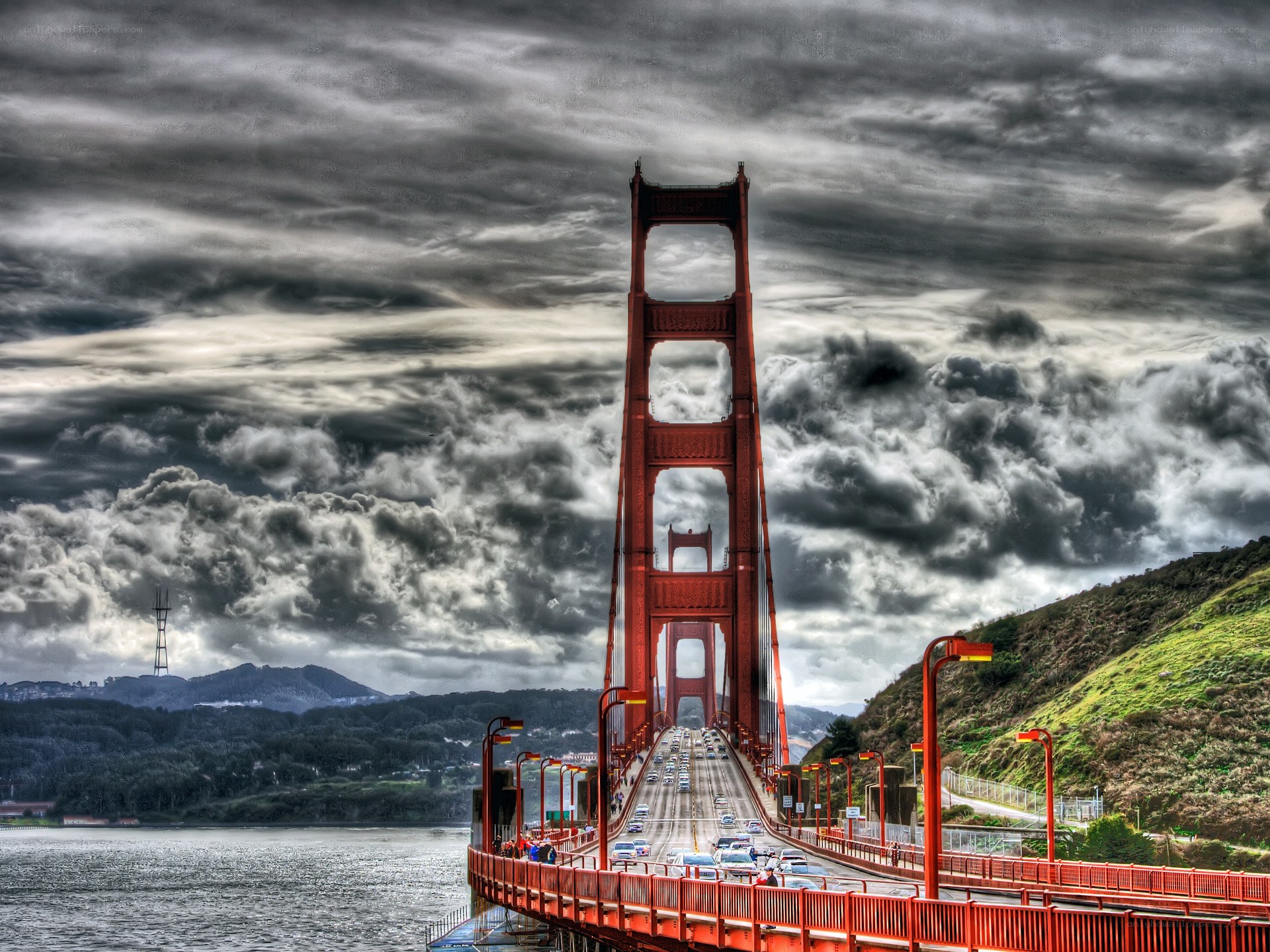 Golden Gate Bridge under stormy sky