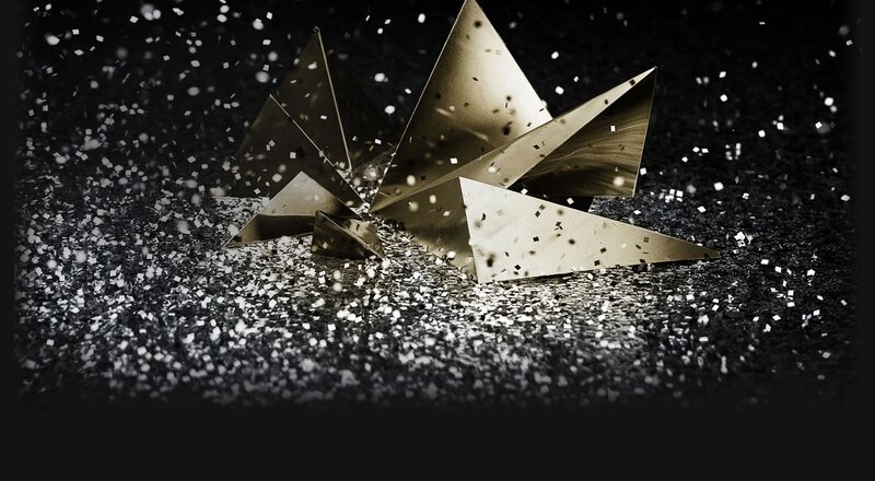 golden geometric shapes with confetti