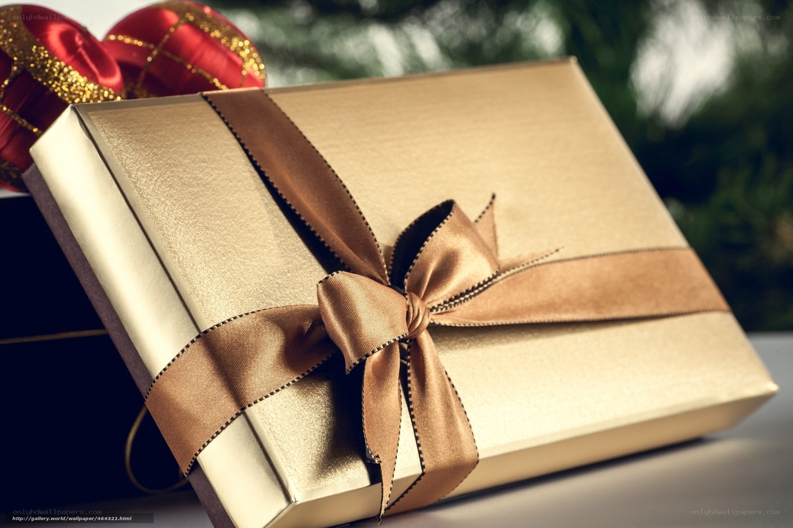 Golden gift box with bow